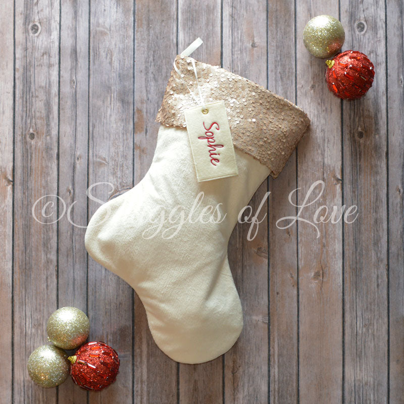Personalized champagne sequin Christmas stocking with cream velvet and name tag