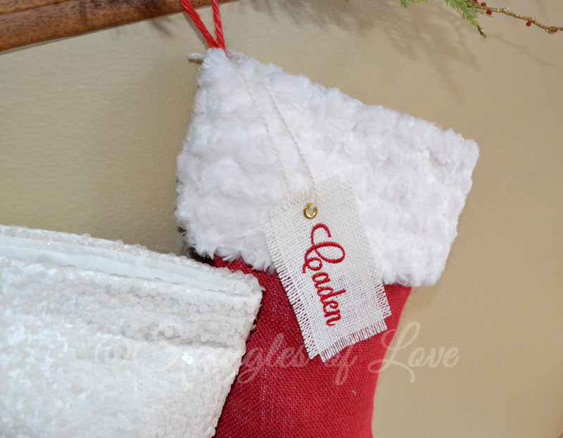 Red burlap Christmas stockings with ivory cuffs